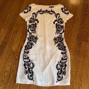 Cream silk dress with black floral details